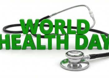 Beyaz zemin üzerinde yeşil World Health Day yazısı ve stetoskop.